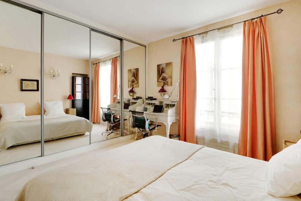 Appartamento Sejour Au Pied De La Tour Eiffel Parigi Esterno foto